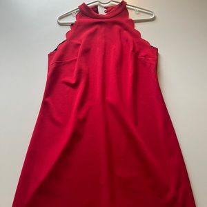 Scalloped bright red short dress.